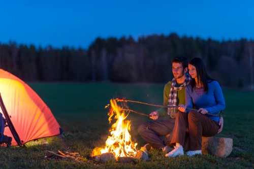 bigstock-Camping-night-couple-cook-by-c-32325227